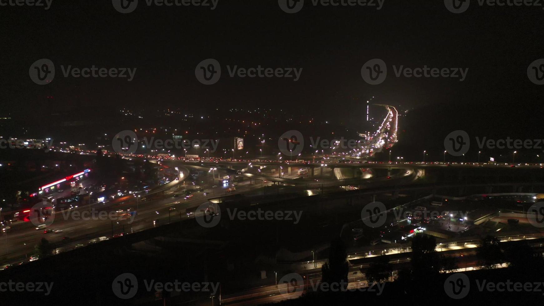 Aerial view of highway interchange at night. photo