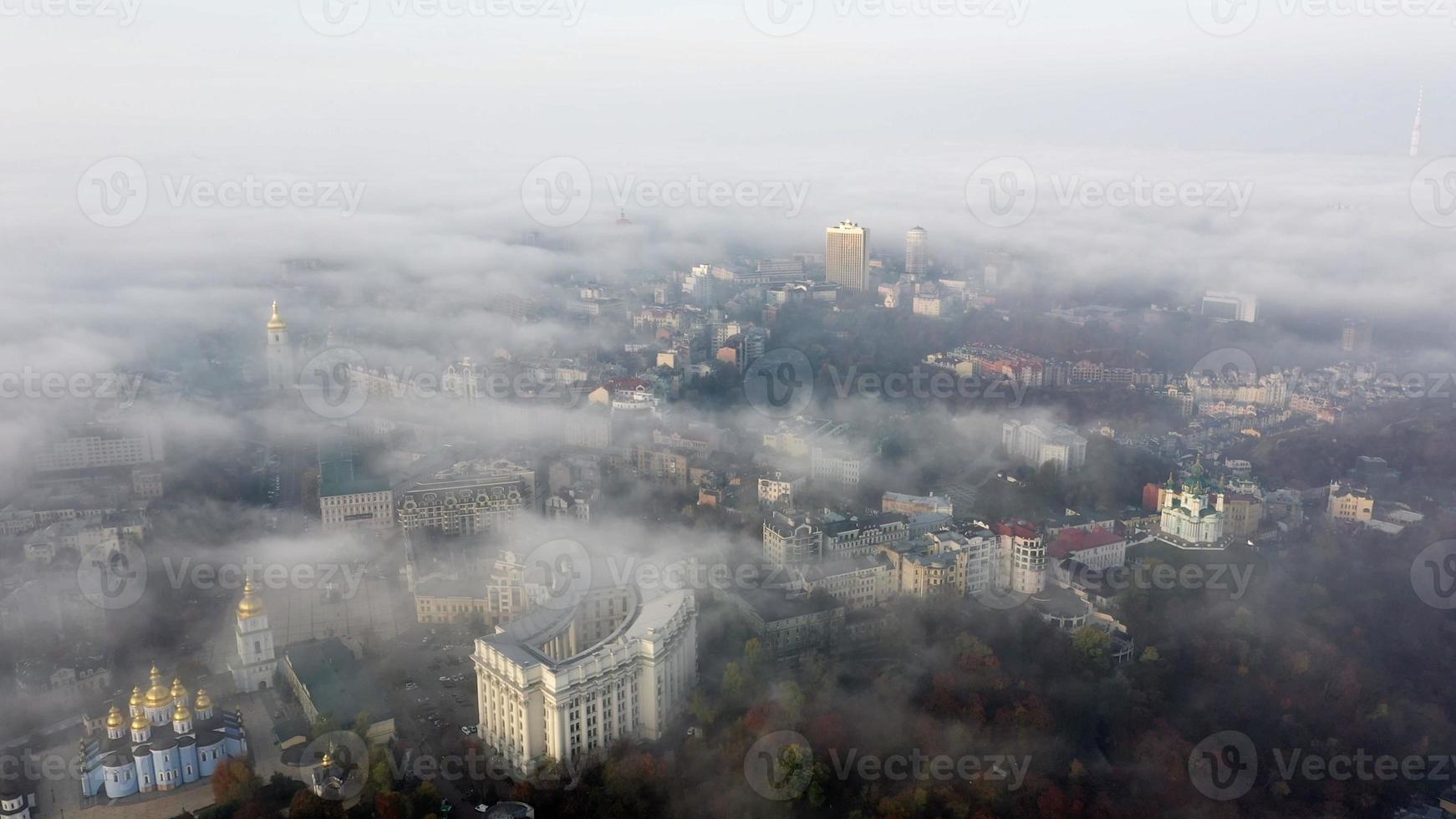 Aerial view of the city in the fog photo