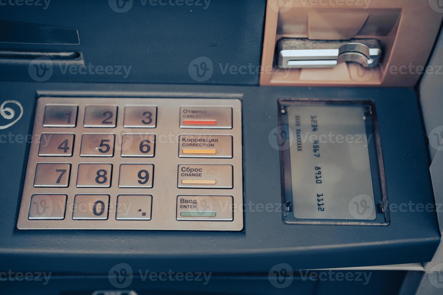 Automated teller machine close up. ATM machine keypad. photo