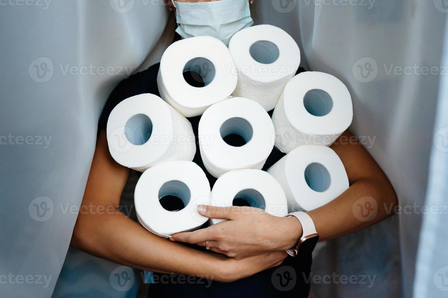 People are stocking up toilet paper for home quarantine from crownavirus. photo
