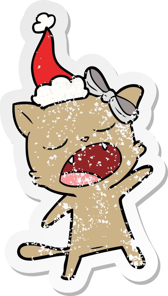 distressed sticker cartoon of a singing cat wearing santa hat vector