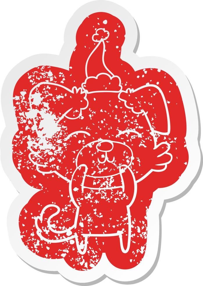 cartoon distressed sticker of a dog wearing santa hat vector