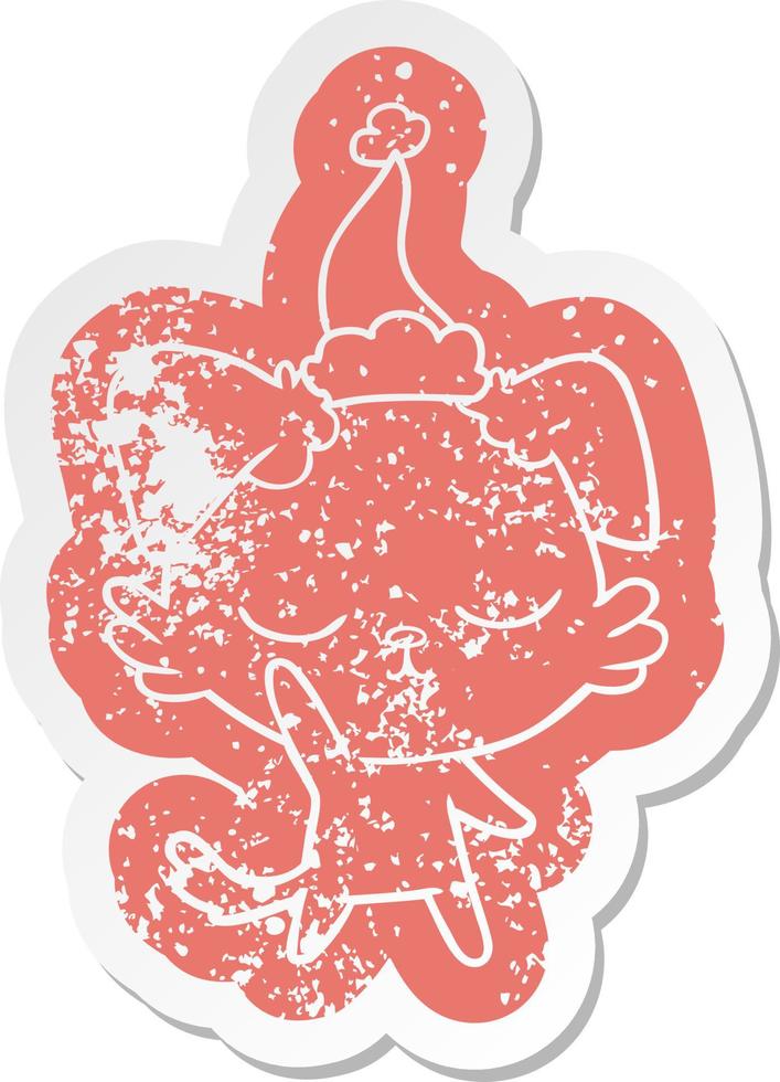 cute cartoon distressed sticker of a dog wearing santa hat vector