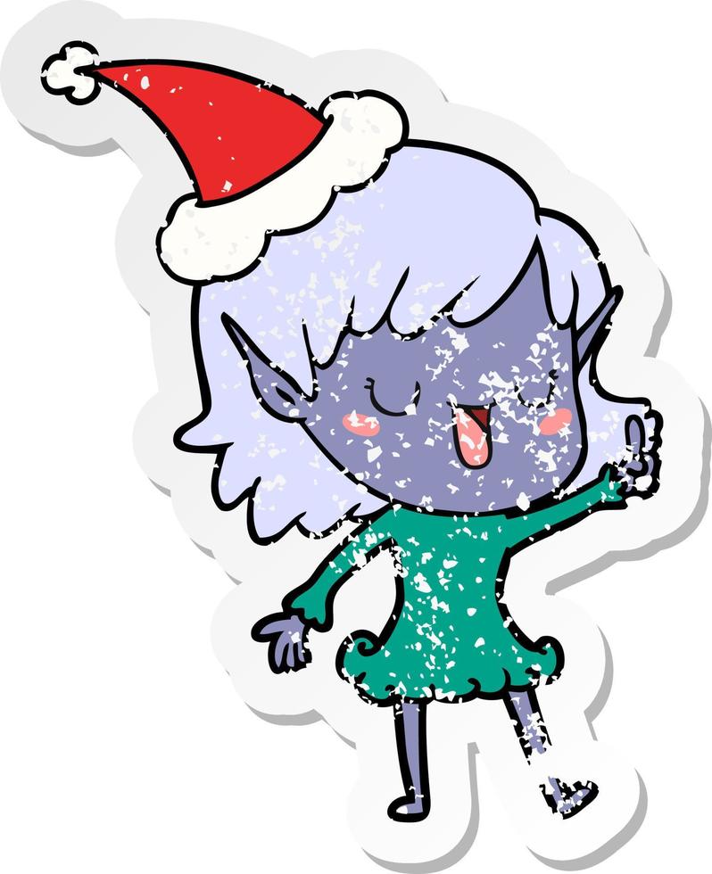 distressed sticker cartoon of a elf girl wearing santa hat vector
