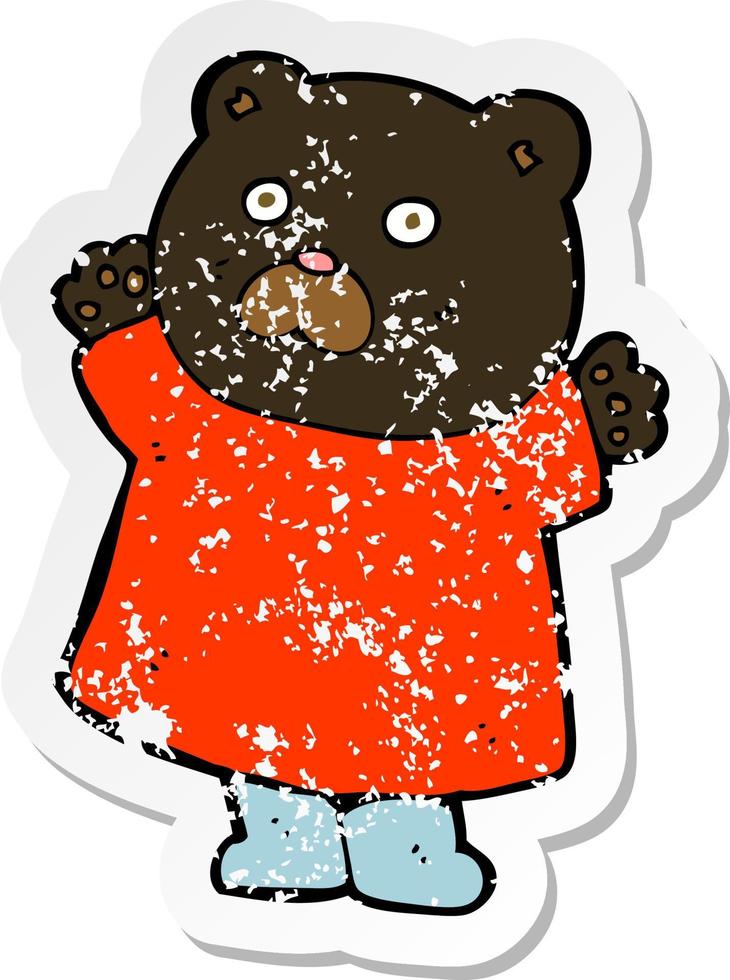 retro distressed sticker of a funny cartoon black bear vector