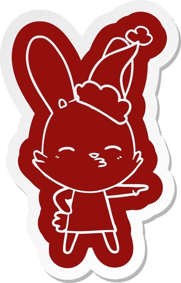 curious bunny cartoon  sticker of a wearing santa hat vector