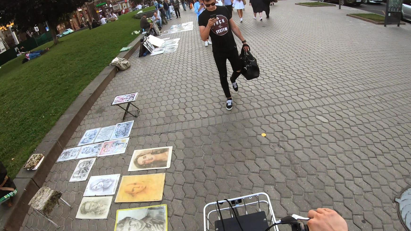 Kiev, Ukraine - May 21, 2021 First-person view. Man rides a bicycle in the Kiev photo