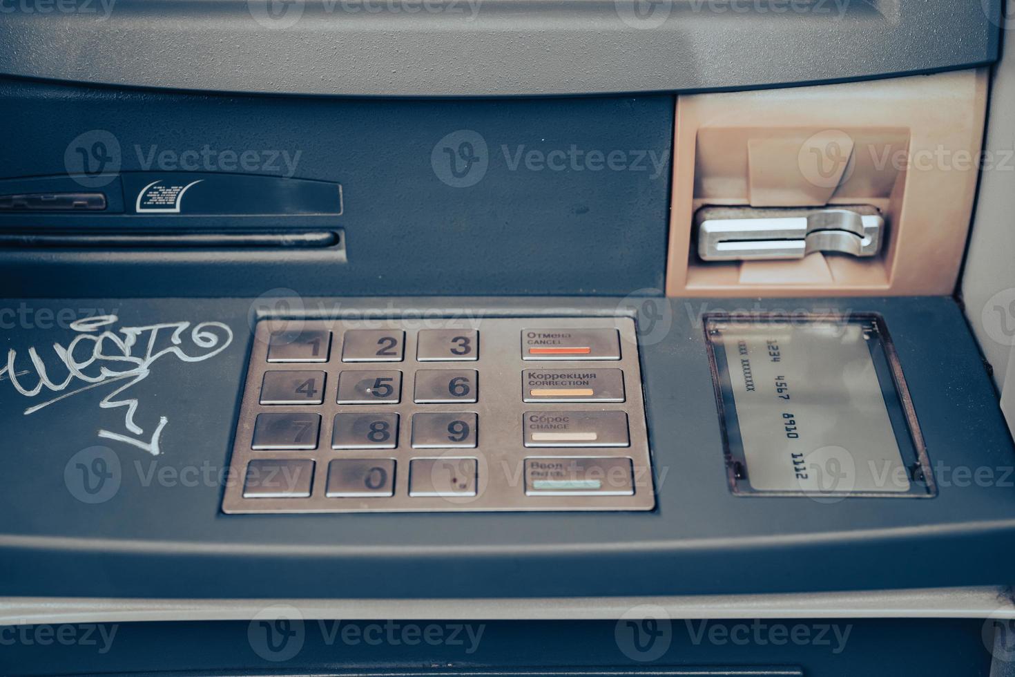 Automated teller machine close up. ATM machine keypad. photo