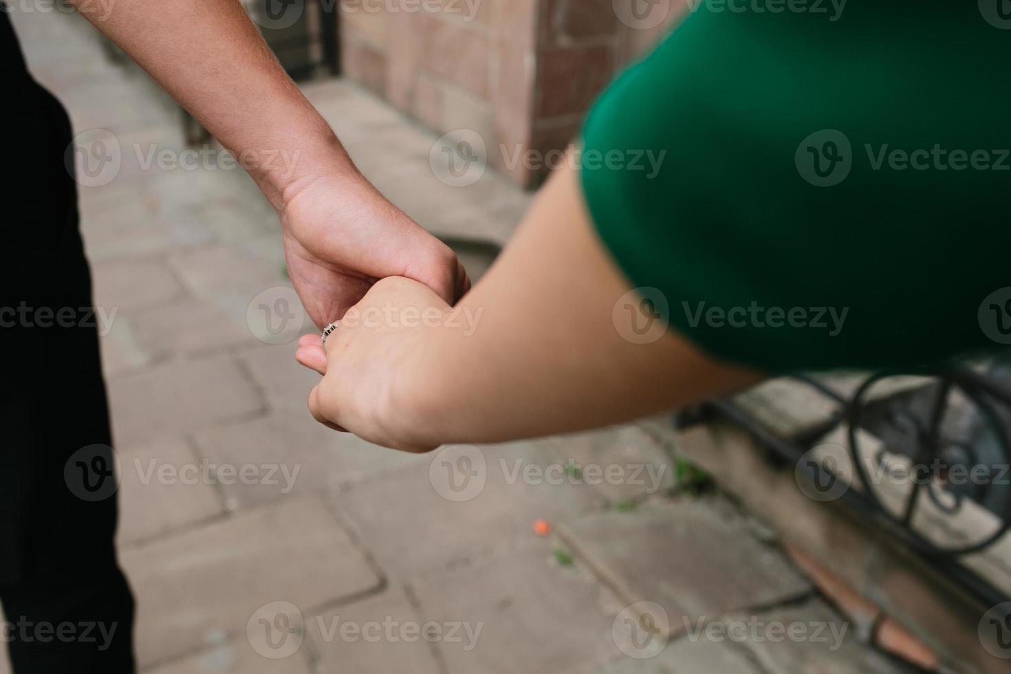 European beautiful couple posing on the street photo