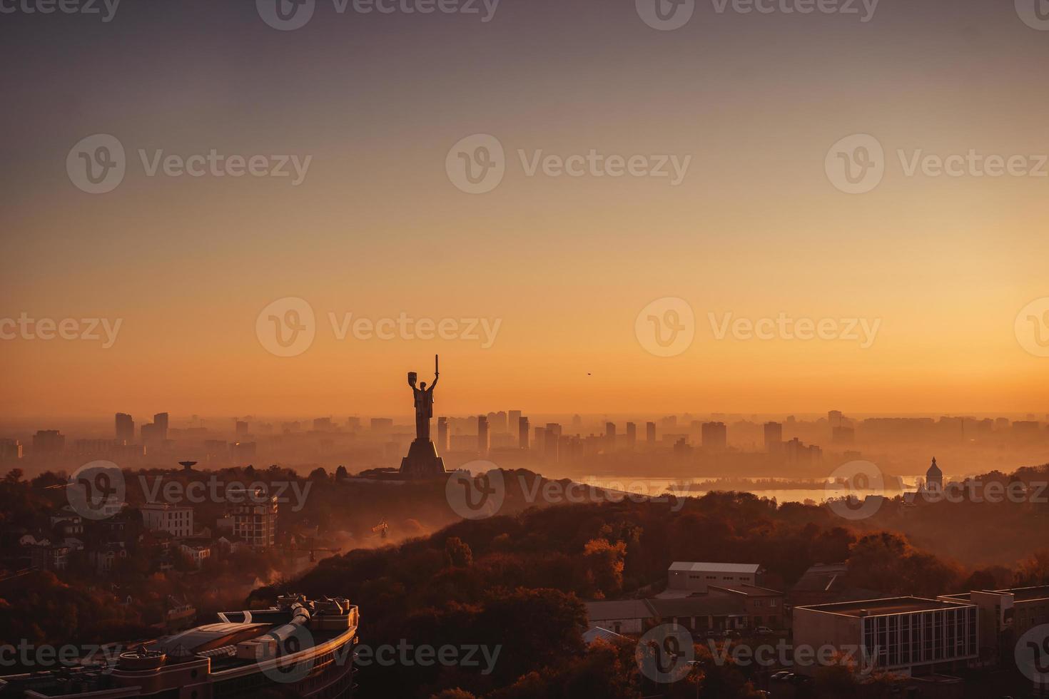 Mother Motherland monument at sunset. In Kiev, Ukraine. photo