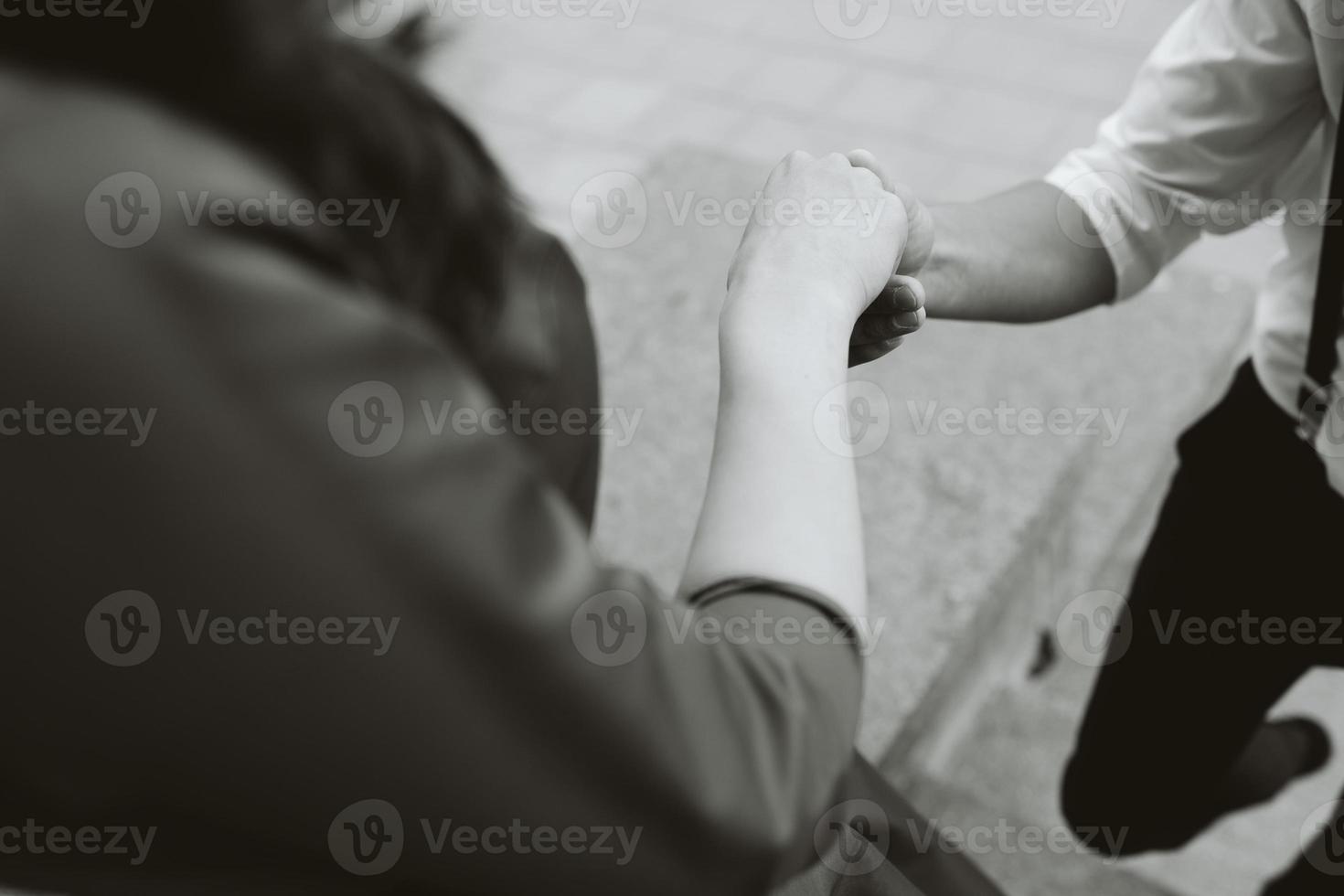 European beautiful couple posing on the street photo