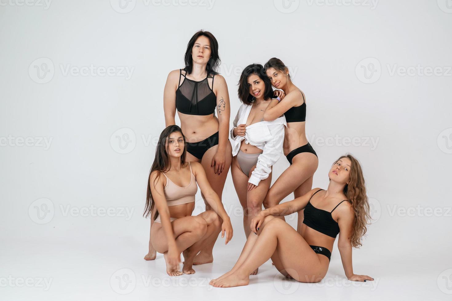 diverse models wearing comfortable underwear, enjoying time together photo