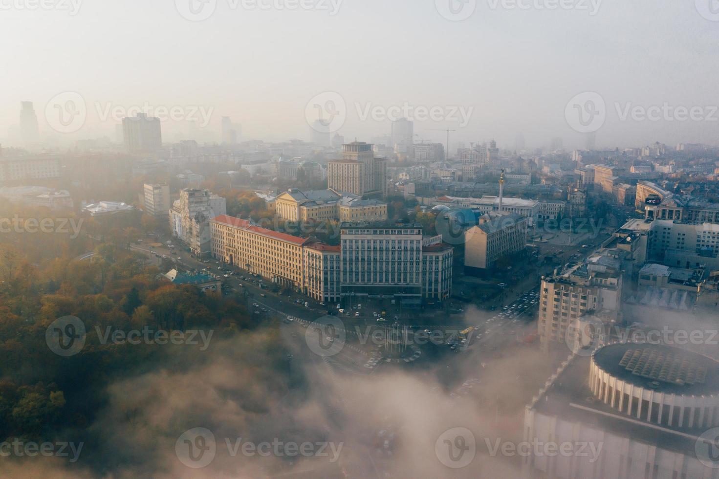 Aerial view of the city in the fog photo