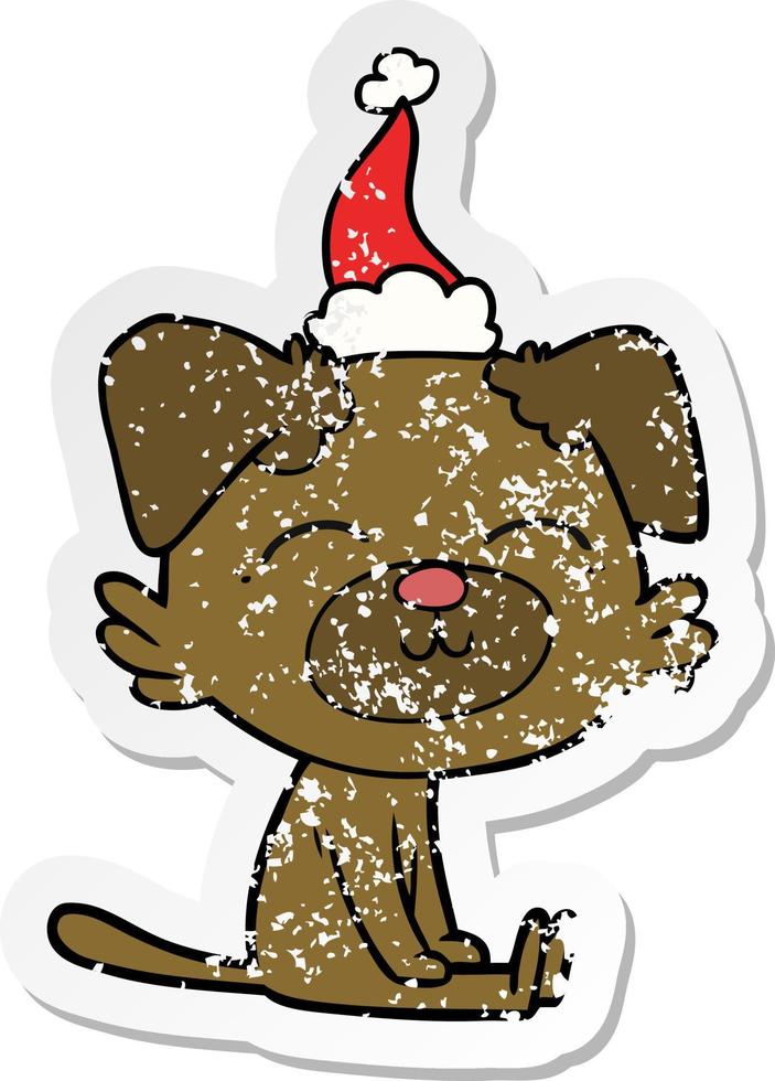 distressed sticker cartoon of a dog wearing santa hat vector