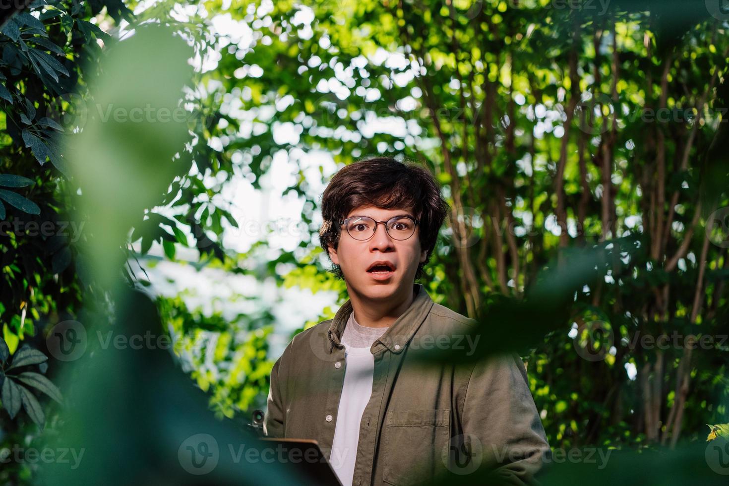 Nature protection and wildlife preservation concept. Male scientist looking at the camera photo