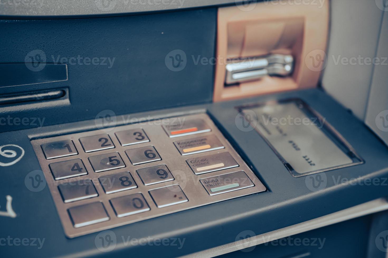 Automated teller machine close up. ATM machine keypad. photo