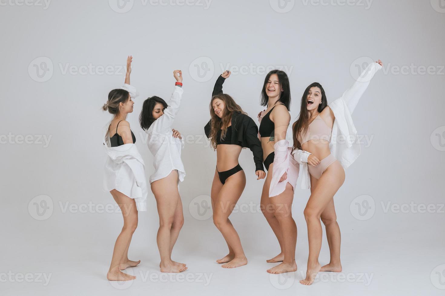 diverse models wearing comfortable underwear, enjoying time together photo