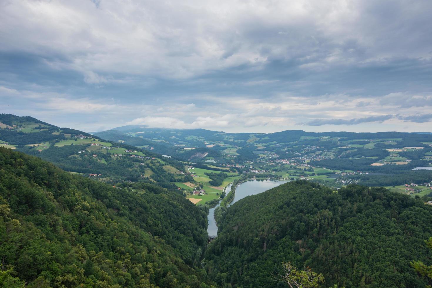 wonderful little lake in a green mountain landscape photo