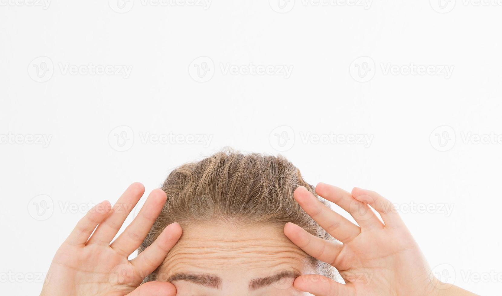 Macro Woman face with wrinkles on the forehead. Collagen and face injections concept. skin care. Cropped image. Copy space and mock up. photo