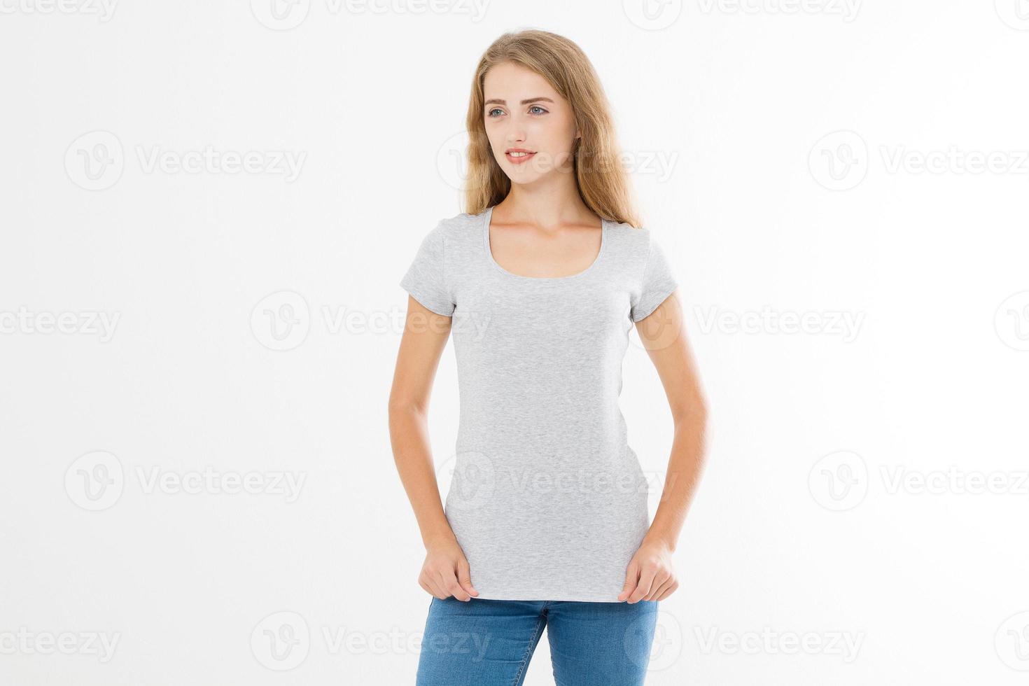 Young blonde woman with fit slim body in blank template t shirt and jeans isolated on white background. Skin and hair care. Copy space and mock up photo