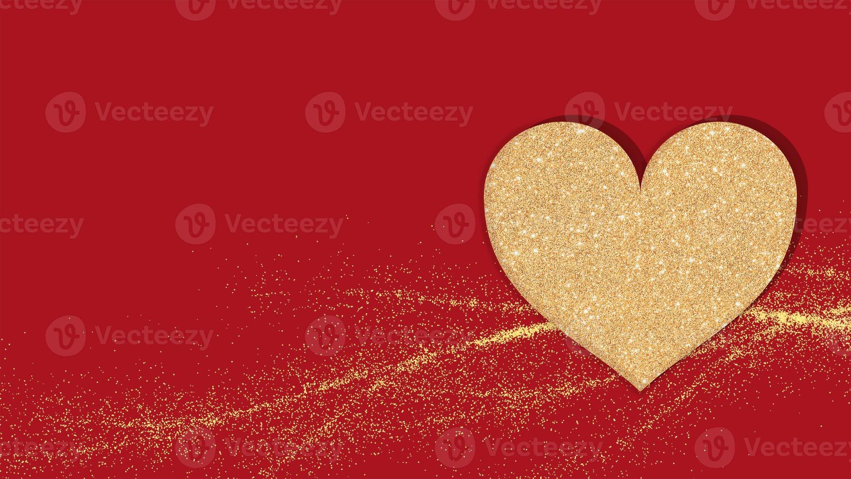 Gold glitter heart on a red background photo