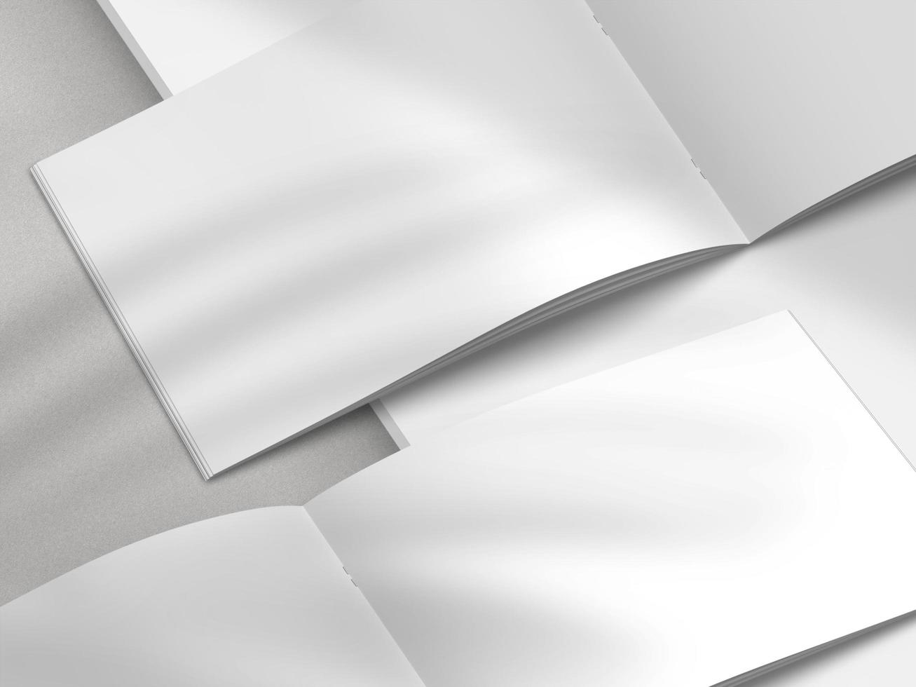 Realistic top view cover and opened portrait A4 or A5 magazine or brochure booklet for stationery and branding. Mockup template isolated light grey background and leaf shadow overlay. 3D rendering. photo