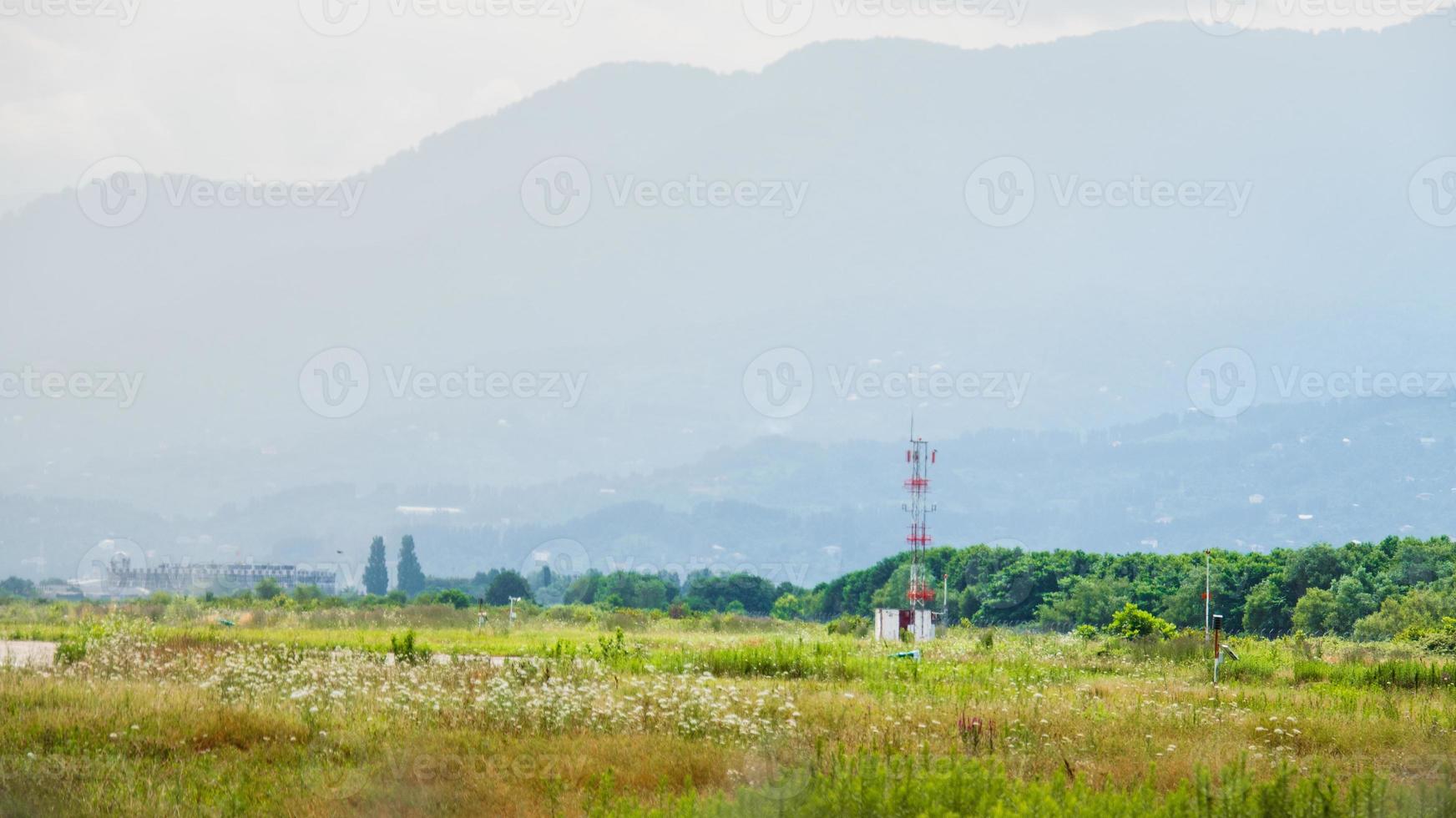 Batumi airport runway special system with sounds of various birds species to chase-off birds protect runway and airplanes from accidents photo