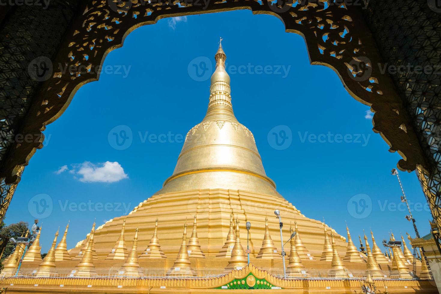 The Shwemawdaw Pagoda is a stupa located in Bago, Myanmar. It is the most tallest pagoda in Myanmar. photo