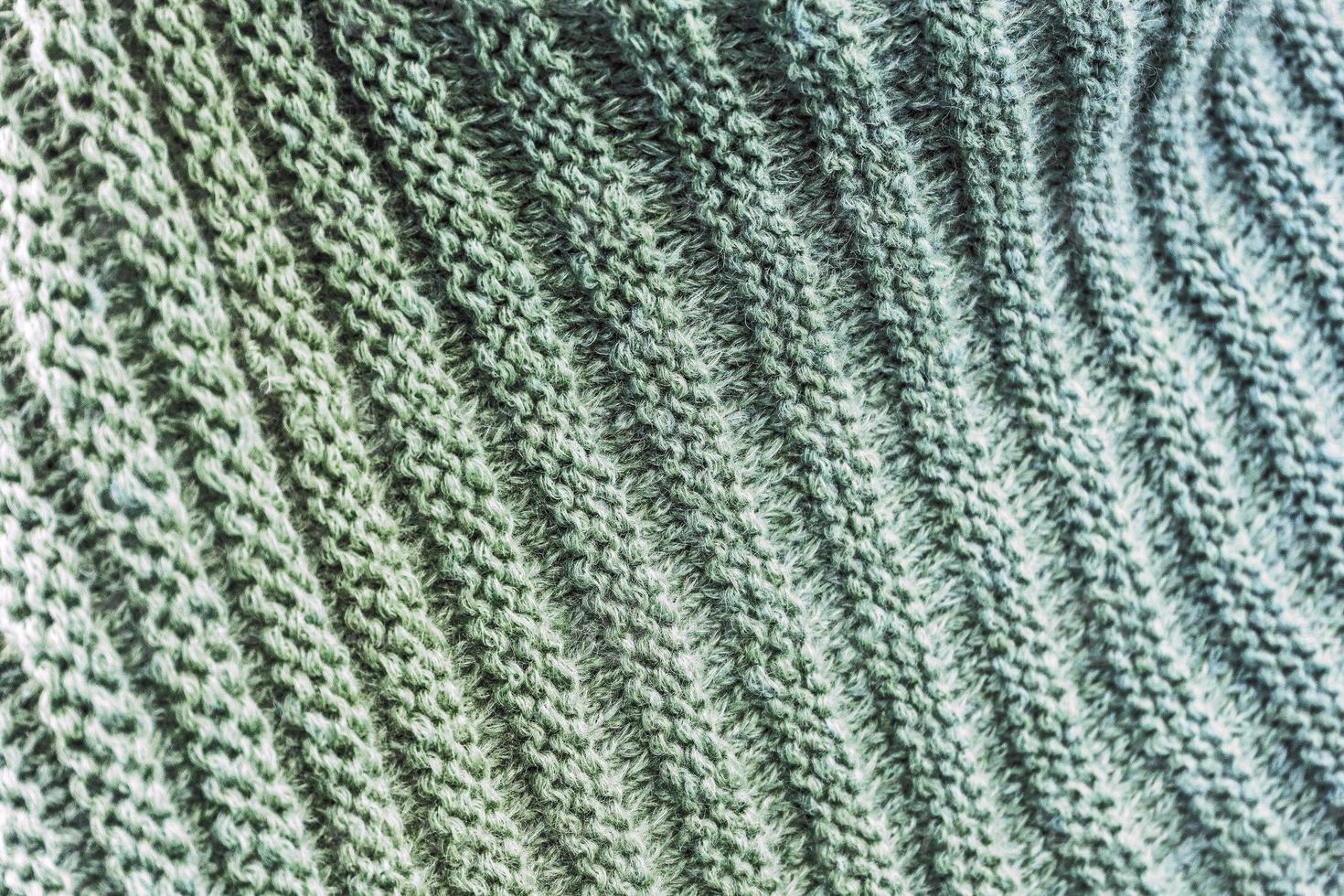 Detailed close up view on samples of cloth and fabrics in different colors found at a fabrics market photo