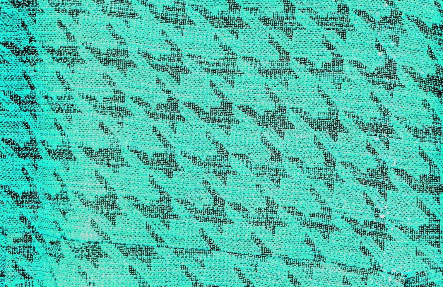 Detailed close up view on samples of cloth and fabrics in different colors found at a fabrics market photo