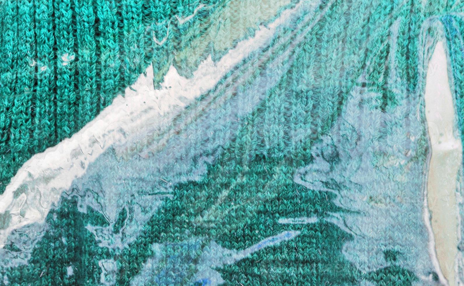 Detailed close up view on samples of cloth and fabrics in different colors found at a fabrics market photo