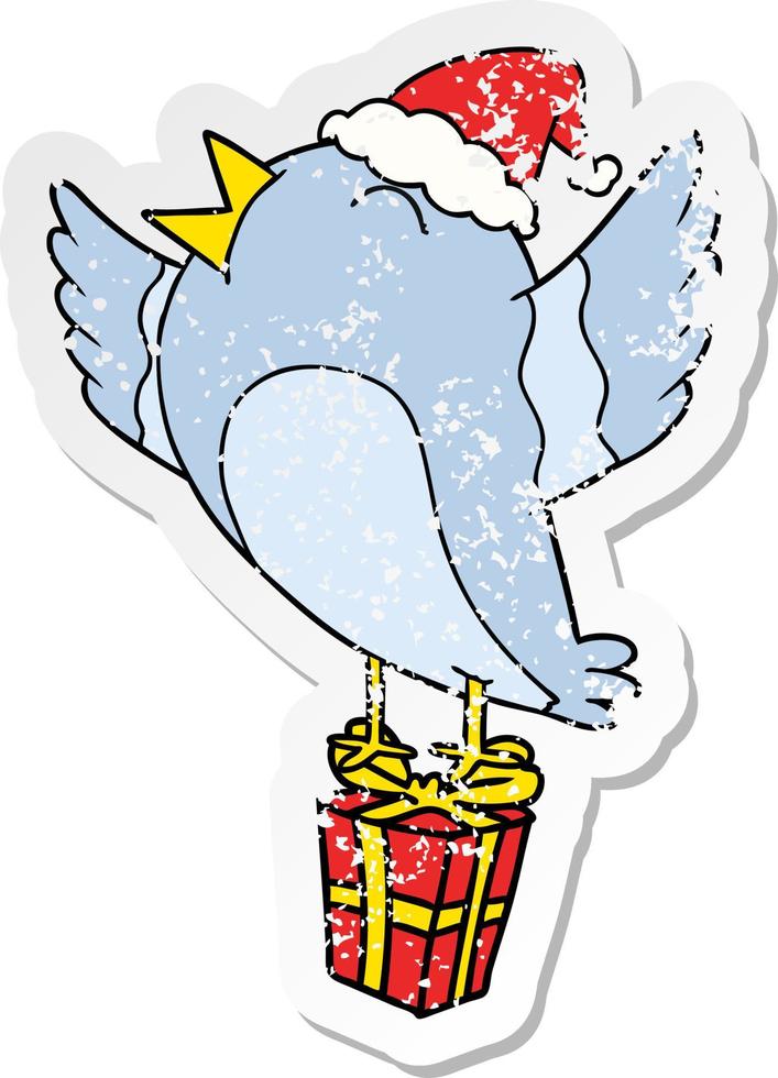 distressed sticker cartoon of a bird wearing santa hat vector