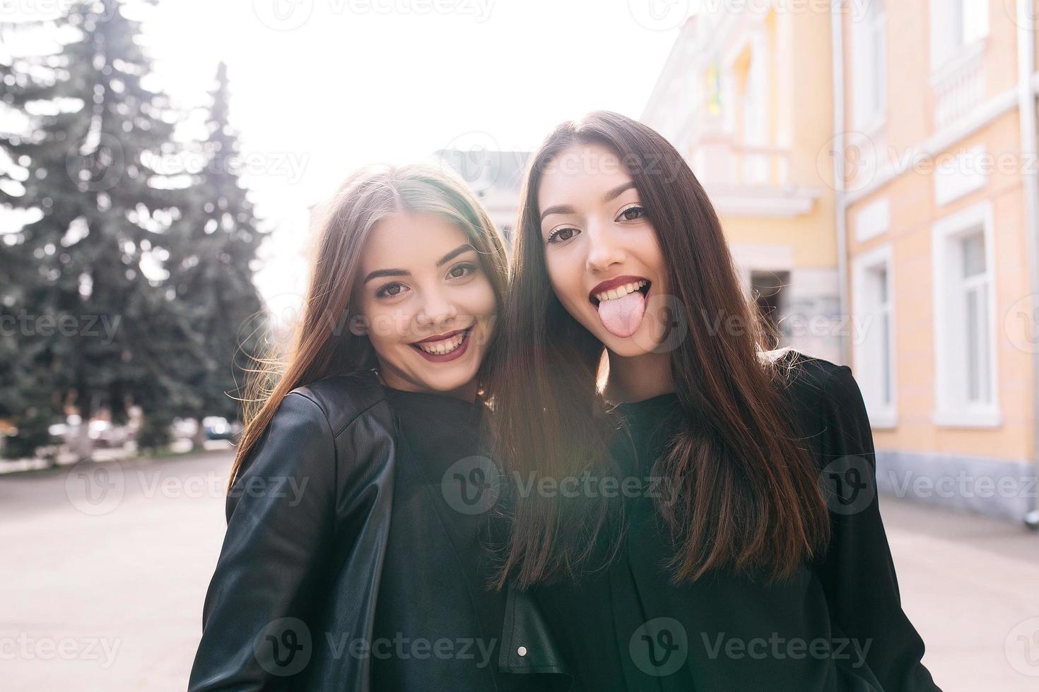 Two young adult girls photo