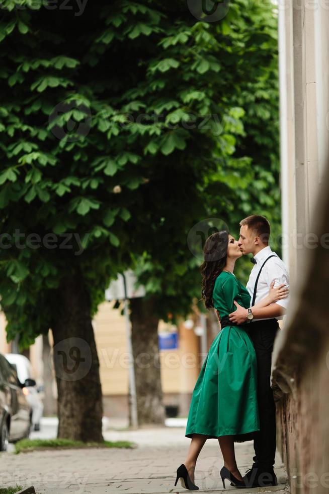 European beautiful couple posing on the street photo