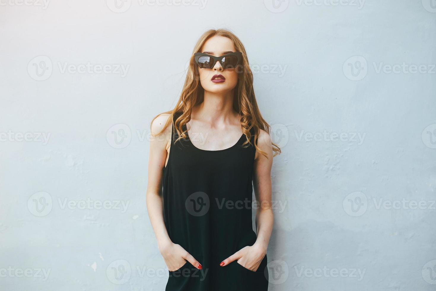 Attractive fashion woman in black dress photo