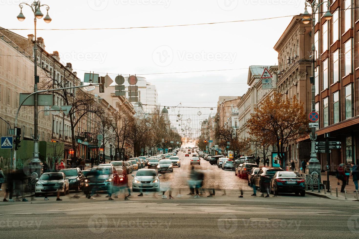 KIEV, UKRAINE - APRIL 14, 2019 Night view of the streets of Kiev. Urban fuss. Bogdan Khmelnitsky Street photo