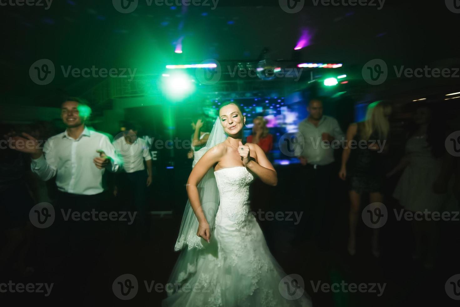 beautiful bride and groom dancing photo