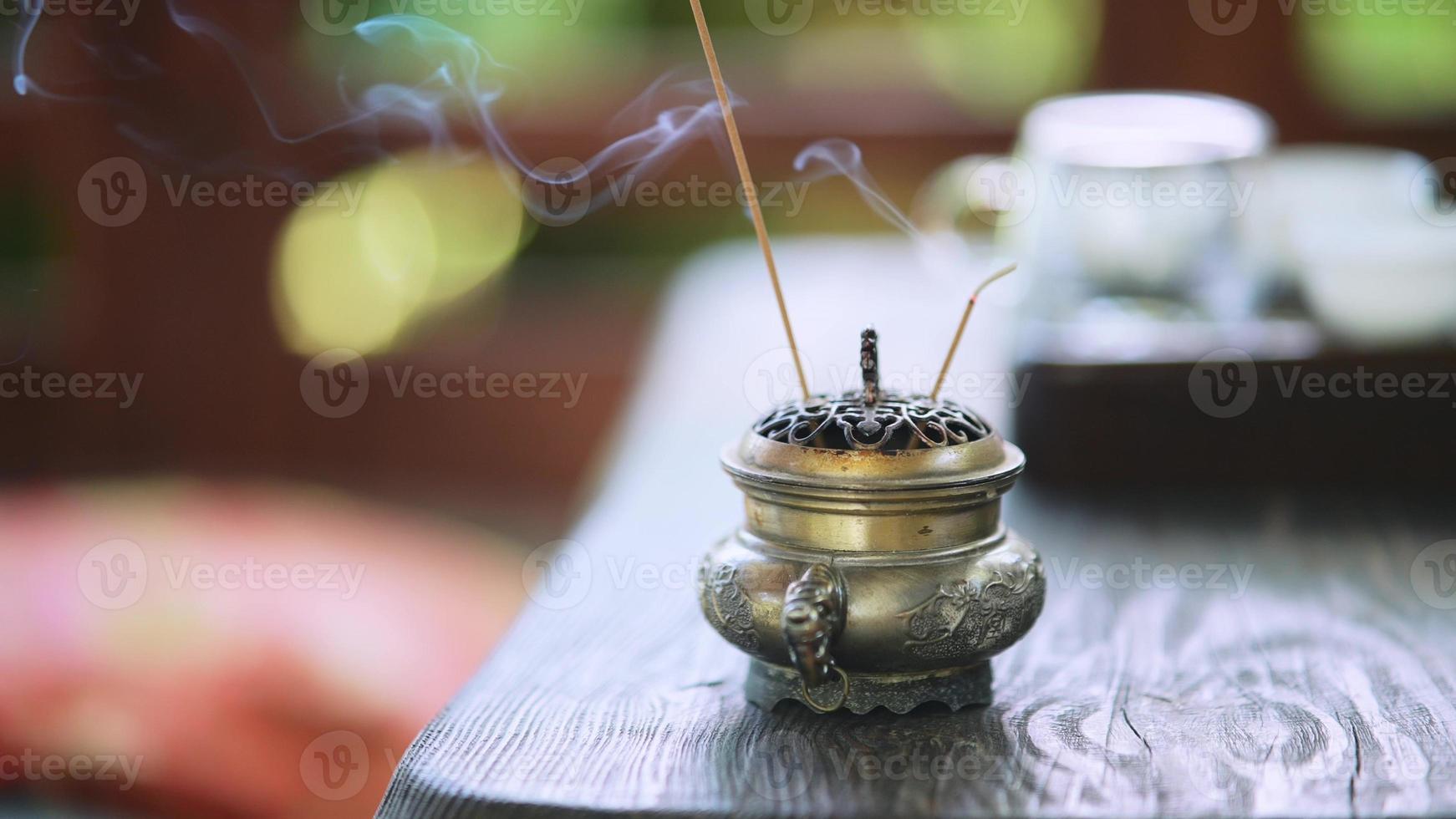 Close up of Asian Buddhist Incense Sticks photo
