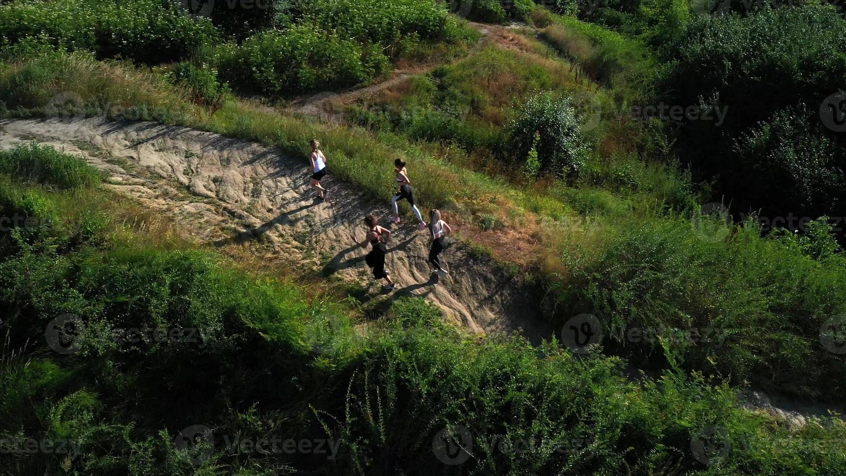 Girls jogging. Healthy lifestyle concept. Sport girls. Athletic young women doing morning exercises. photo