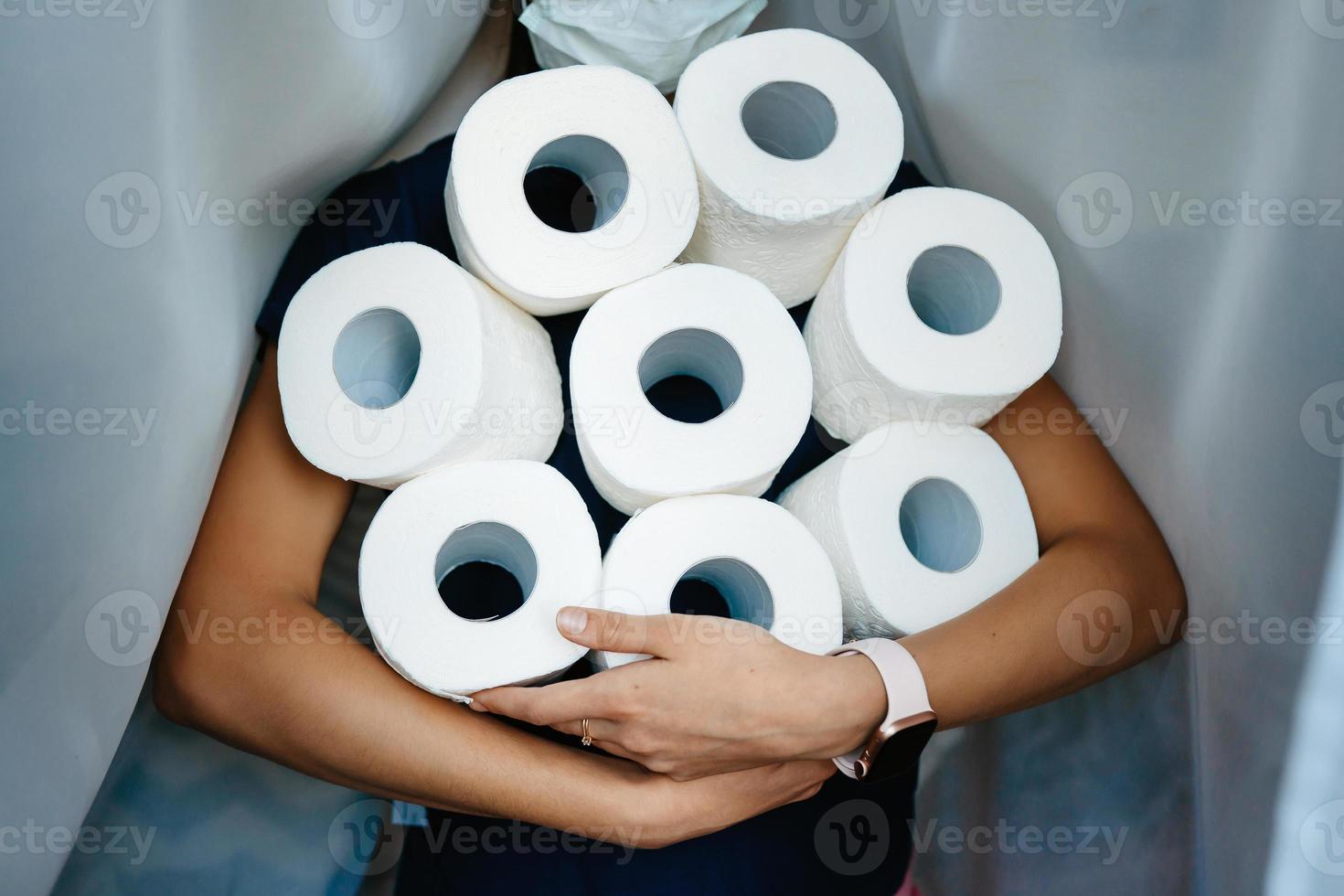 People are stocking up toilet paper for home quarantine from crownavirus. photo