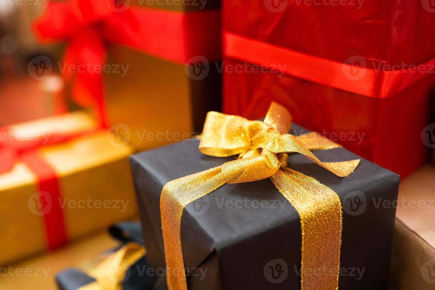 Gift boxes with ribbons of different colors photo