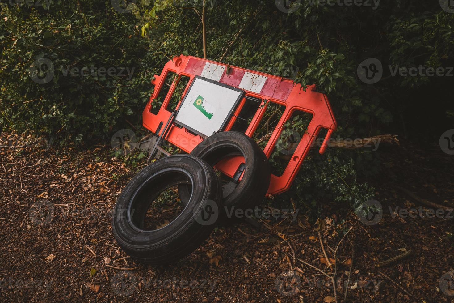 Abandoned tyres in the forest. photo