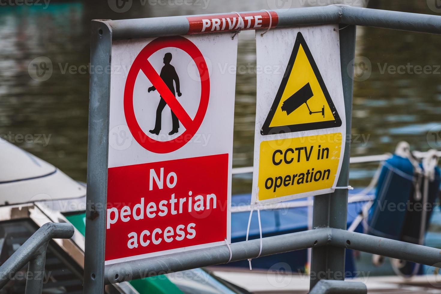 No pedestrian access sign near cctv photo