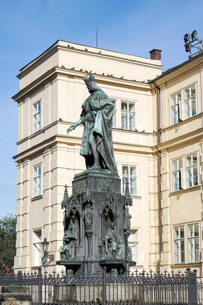 Prague, Czech Republic, 2014. Statue of King Charles IV at the entrance to the Charles Bridge in Prague photo