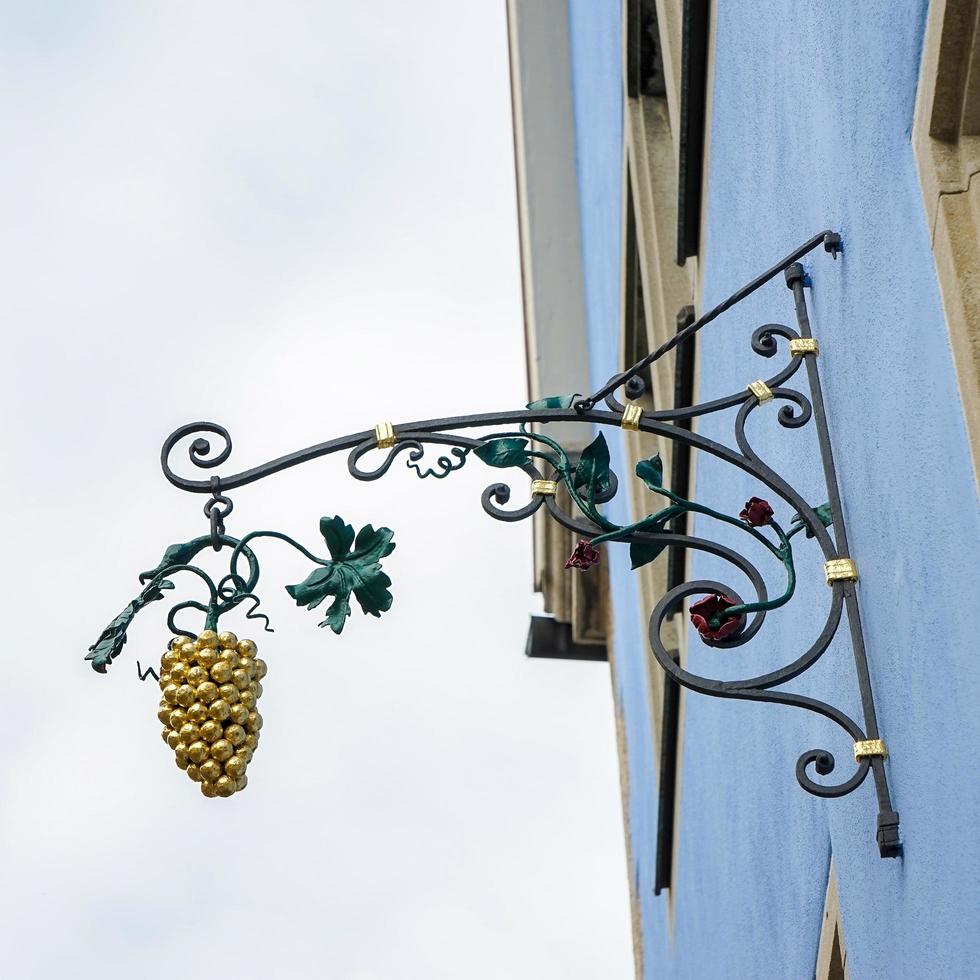 Golden grapes hanging sign in Rothenburg photo