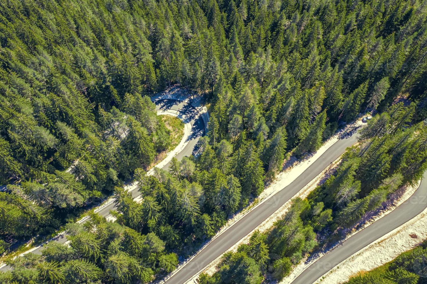 Anstract view from drone of curves of mountain road. Transportation and infrastructure concept photo