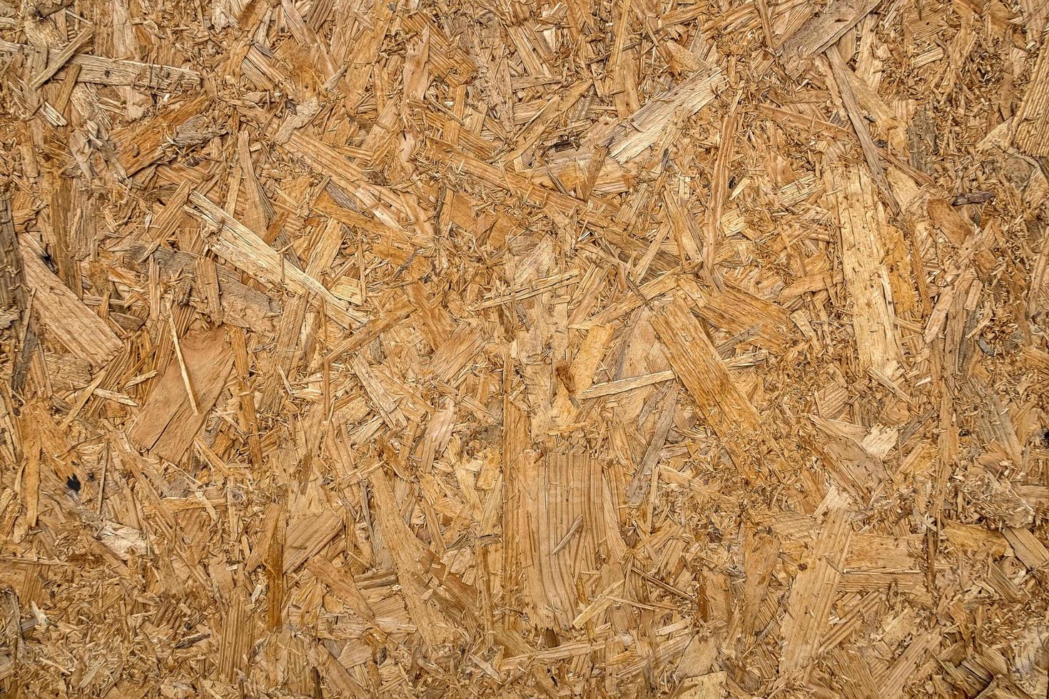wooden texture of hardboard, fiberboard or particle board. Close up photo