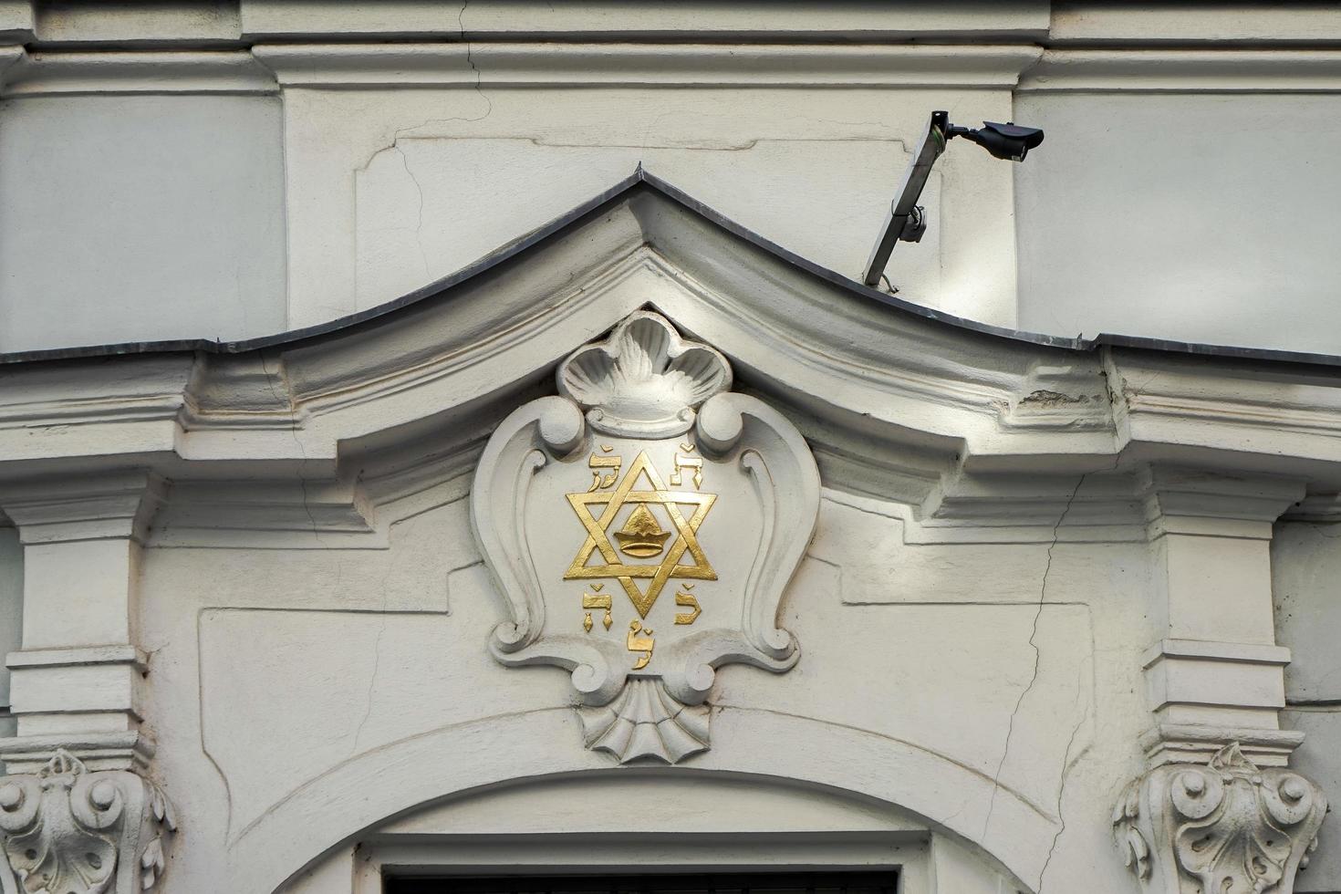 Prague, Czech Republic, 2014. Star of David on an apartment block in the Jewish quarter of Prague photo