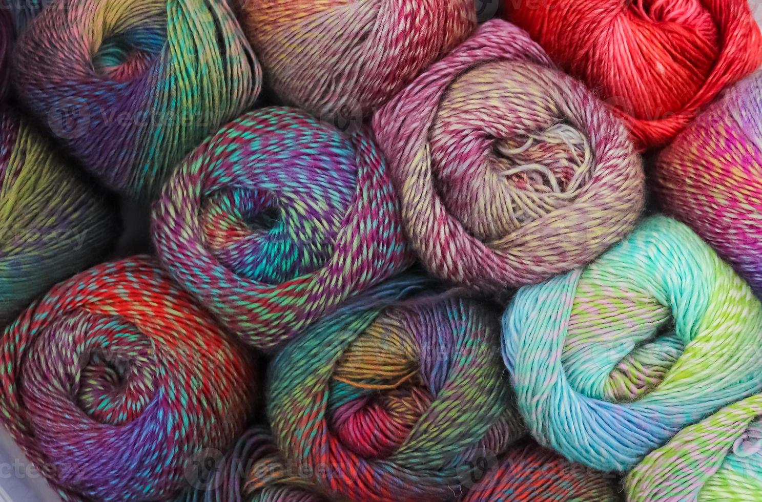 Several rolls of yarn picked up from above photo
