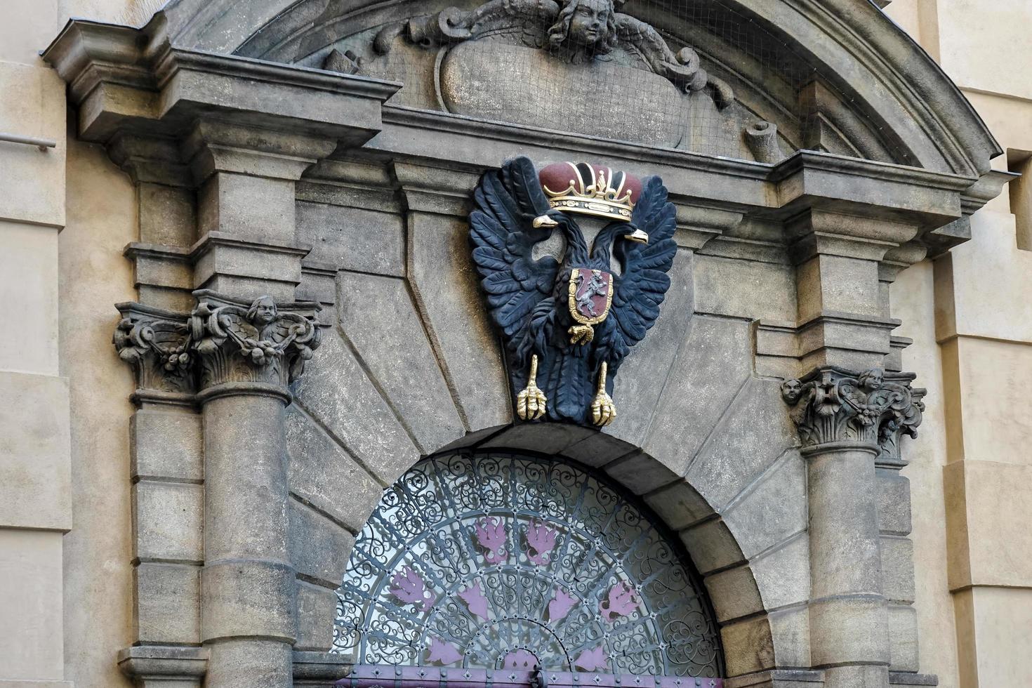 Prague, Czech Republic, 2014. Crest of King Charles IV at entrance to Charles Bridge in Prague photo